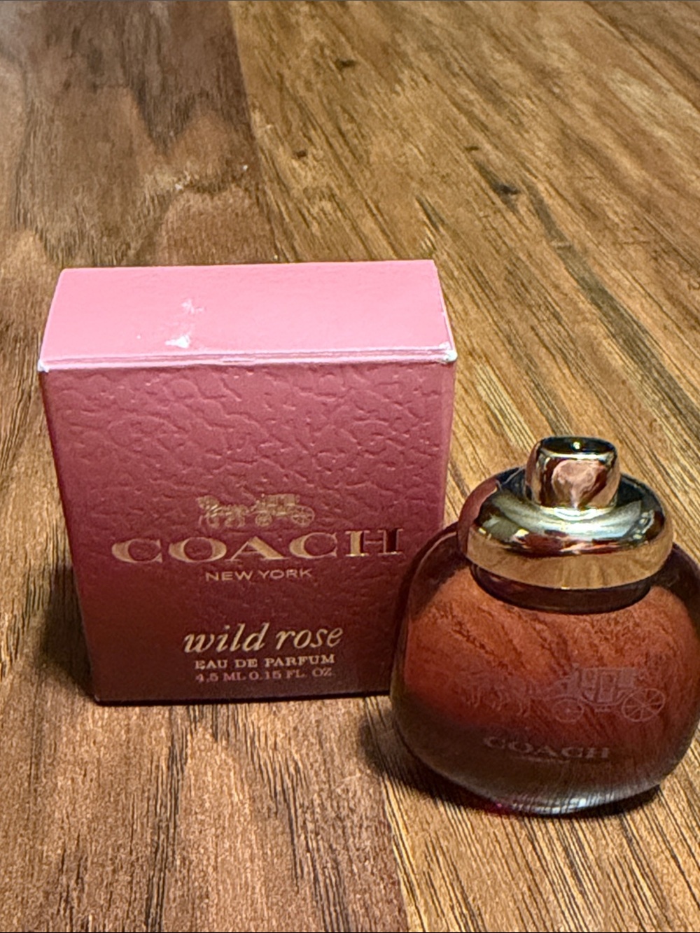 Coach Wild Rose